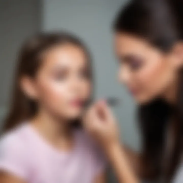 A parent guiding a young girl in applying makeup