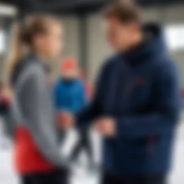 A coach discussing techniques with a young skater during practice.