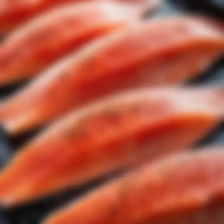 Close-up of fresh red fish fillets with a sprinkle of salt and spices.