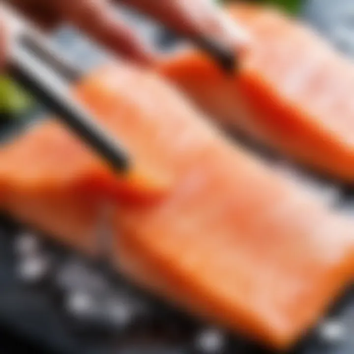 Salt being applied to salmon fillets