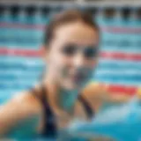 A swimmer demonstrating the freestyle stroke technique in a pool.