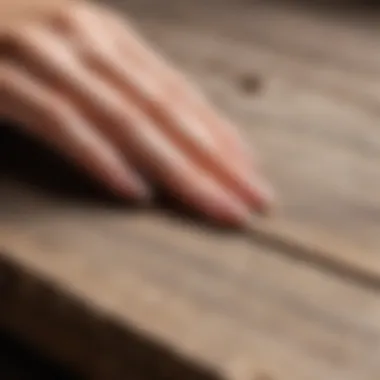 A close-up view of nails positioned on a wooden platform, symbolizing the practice of nail standing.