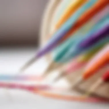 Close-up view of a needle being threaded with colorful embroidery floss