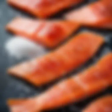 A close-up of red fish fillets sprinkled with salt and sugar