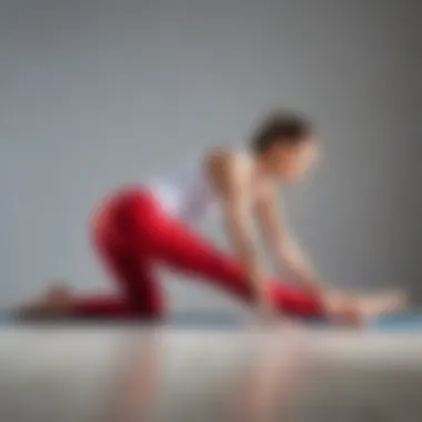 A practitioner demonstrating safe stretching techniques for achieving a split.