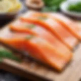 A close-up of freshly salted trout fillets on a wooden board.