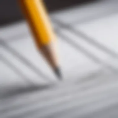 Close-up of a pencil creating lines on a blank page