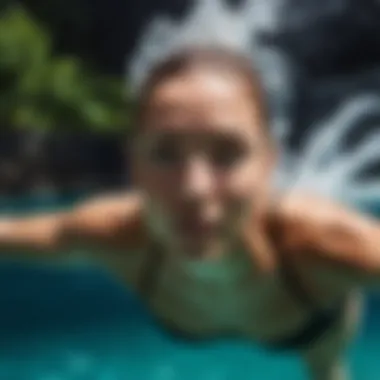 An individual practicing a stroke technique in clear water