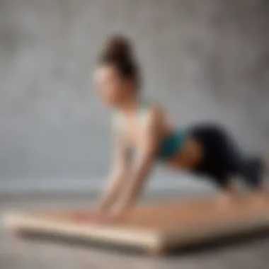 Person practicing yoga on a nail board demonstrating its use